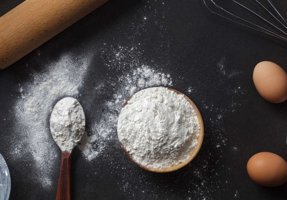 flour-and-ingredients-on-black-table-2021-08-26-16-00-03-utc-4.jpg