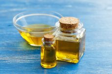 olive-oil-in-bottles-on-a-blue-background-2021-08-26-15-46-40-utc (1) (1)