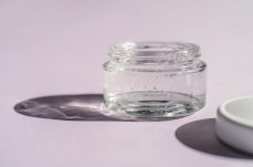 transparent-gel-in-a-jar-on-a-lilac-background-2022-01-27-06-28-31-utc (1) (1)